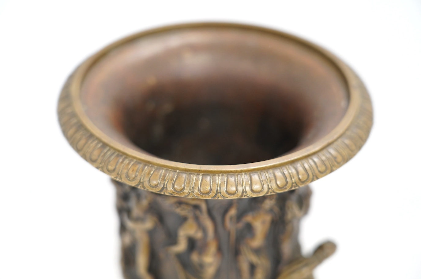 A mid 19th century bronze campana urn with classical figures, 22cm high. Condition - good